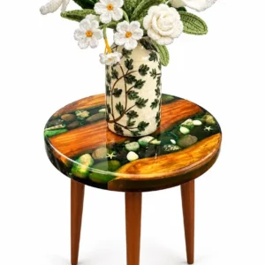 Hand made table with cass and bunch of crochet flowers